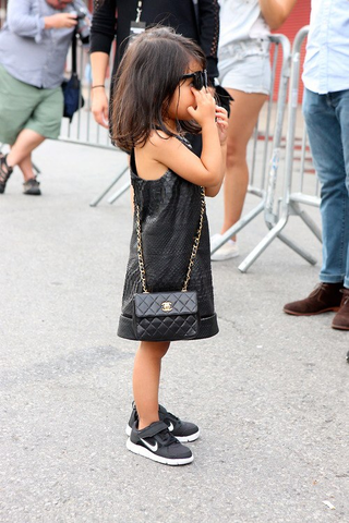Illustration for article titled Is your wardrobe as fabulous as this small child's?